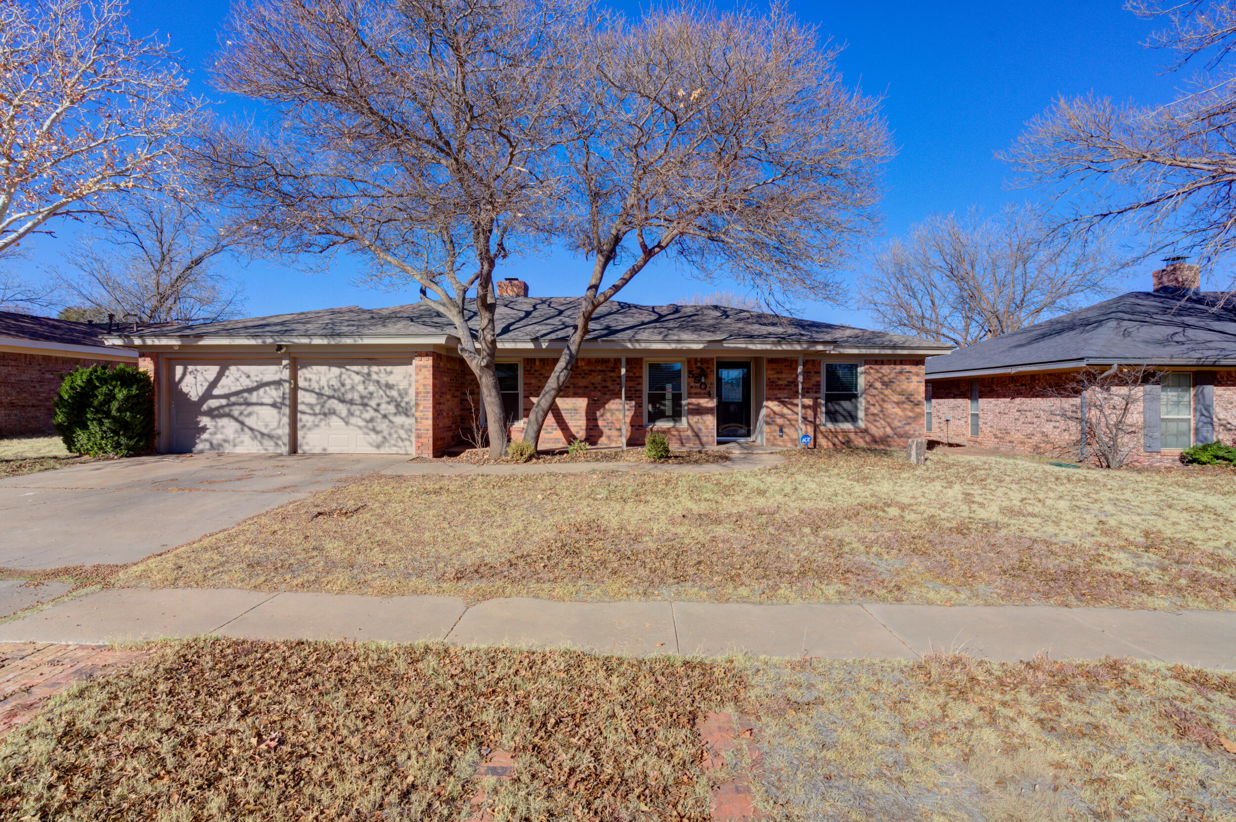 5504 73rd Street Lubbock, TX 79424 - Photo 39 of 39 a view of a chairs with an outdoor space