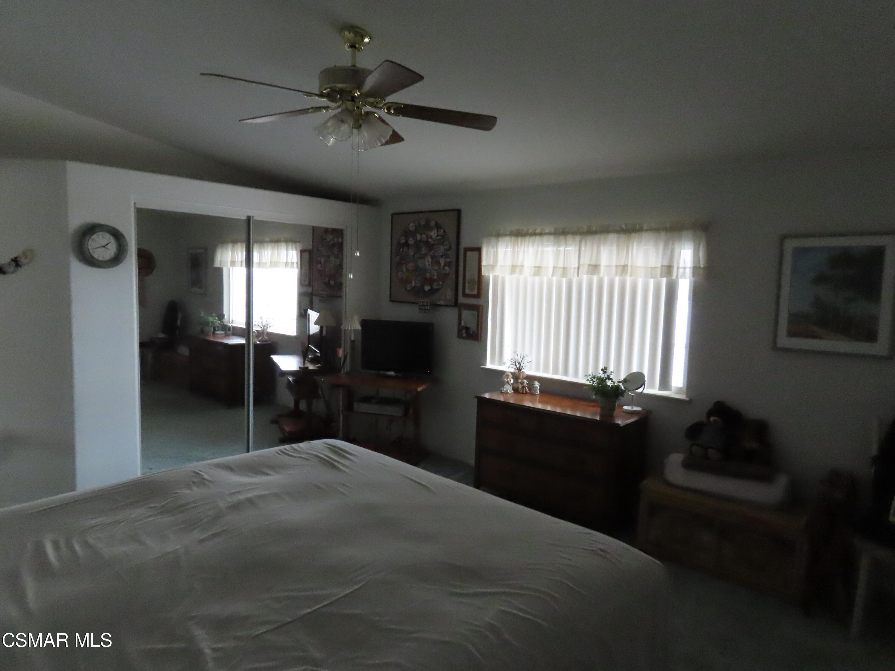 250 East Telegraph Road, Unit 58 Fillmore, CA 93015 - Photo 12 of 29 a bedroom with a bed and a dresser