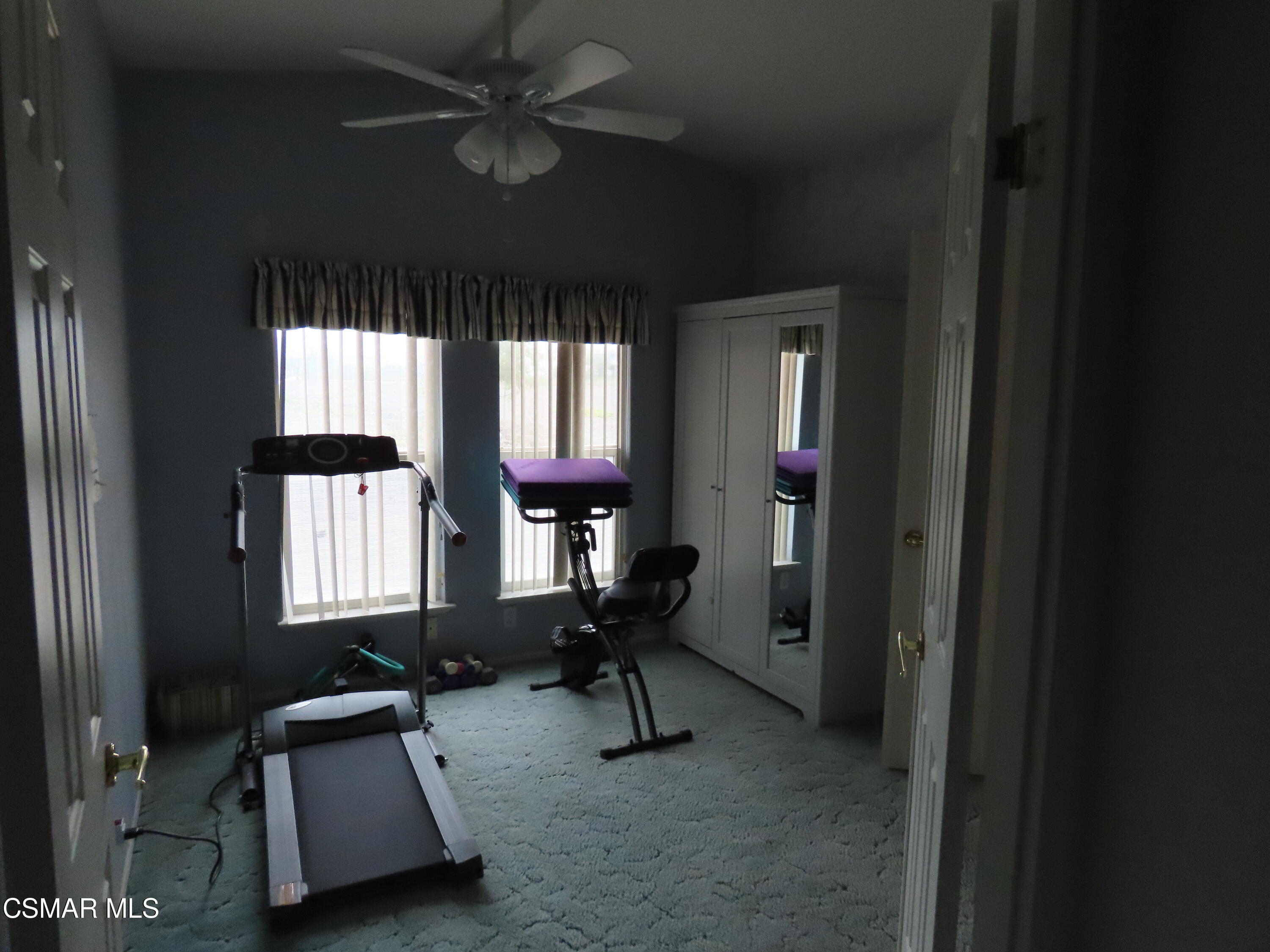 250 East Telegraph Road, Unit 58 Fillmore, CA 93015 - Photo 13 of 29 a room with gym equipment and a window