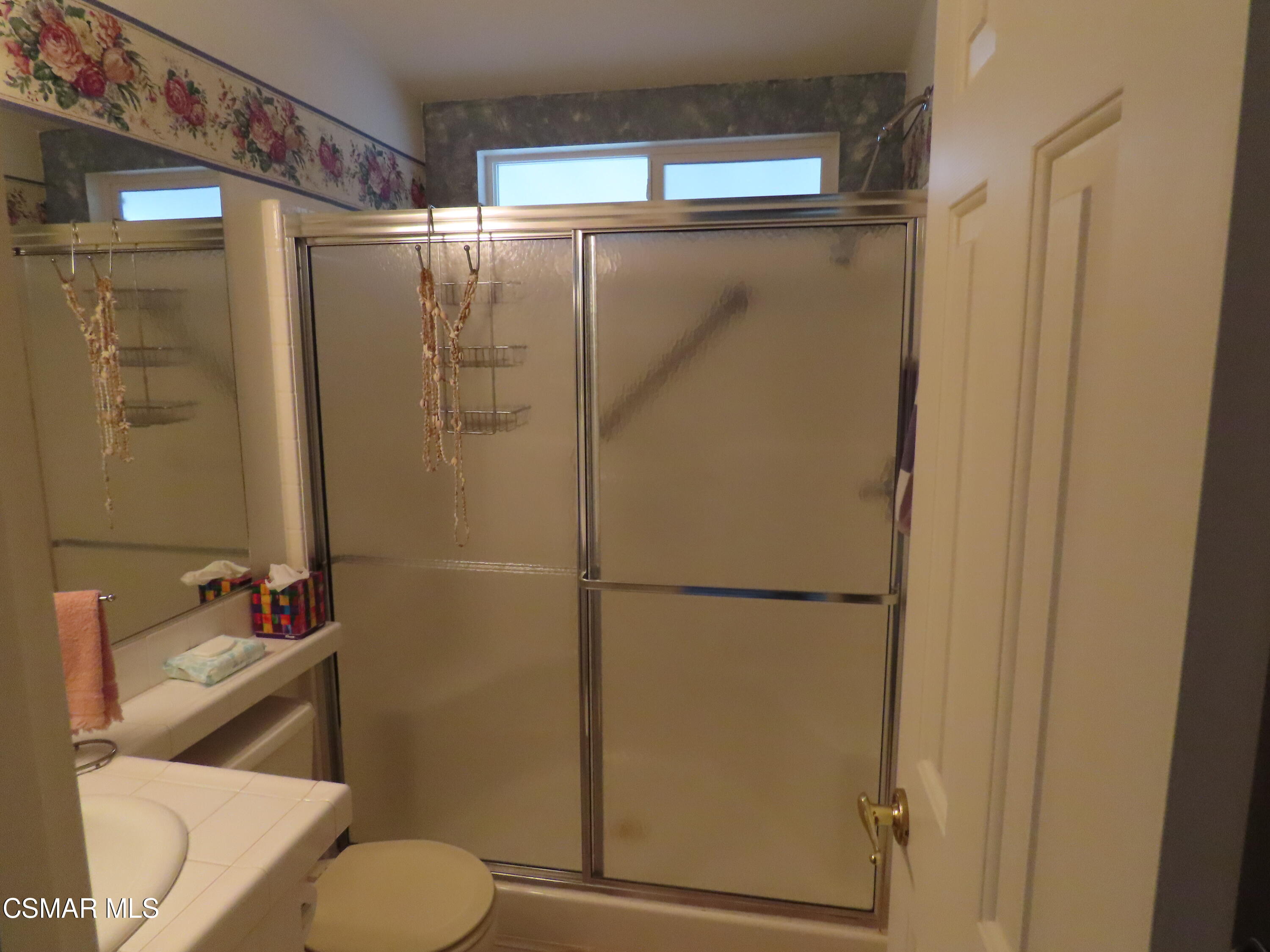 250 East Telegraph Road, Unit 58 Fillmore, CA 93015 - Photo 16 of 29 a bathroom with a shower and toilet