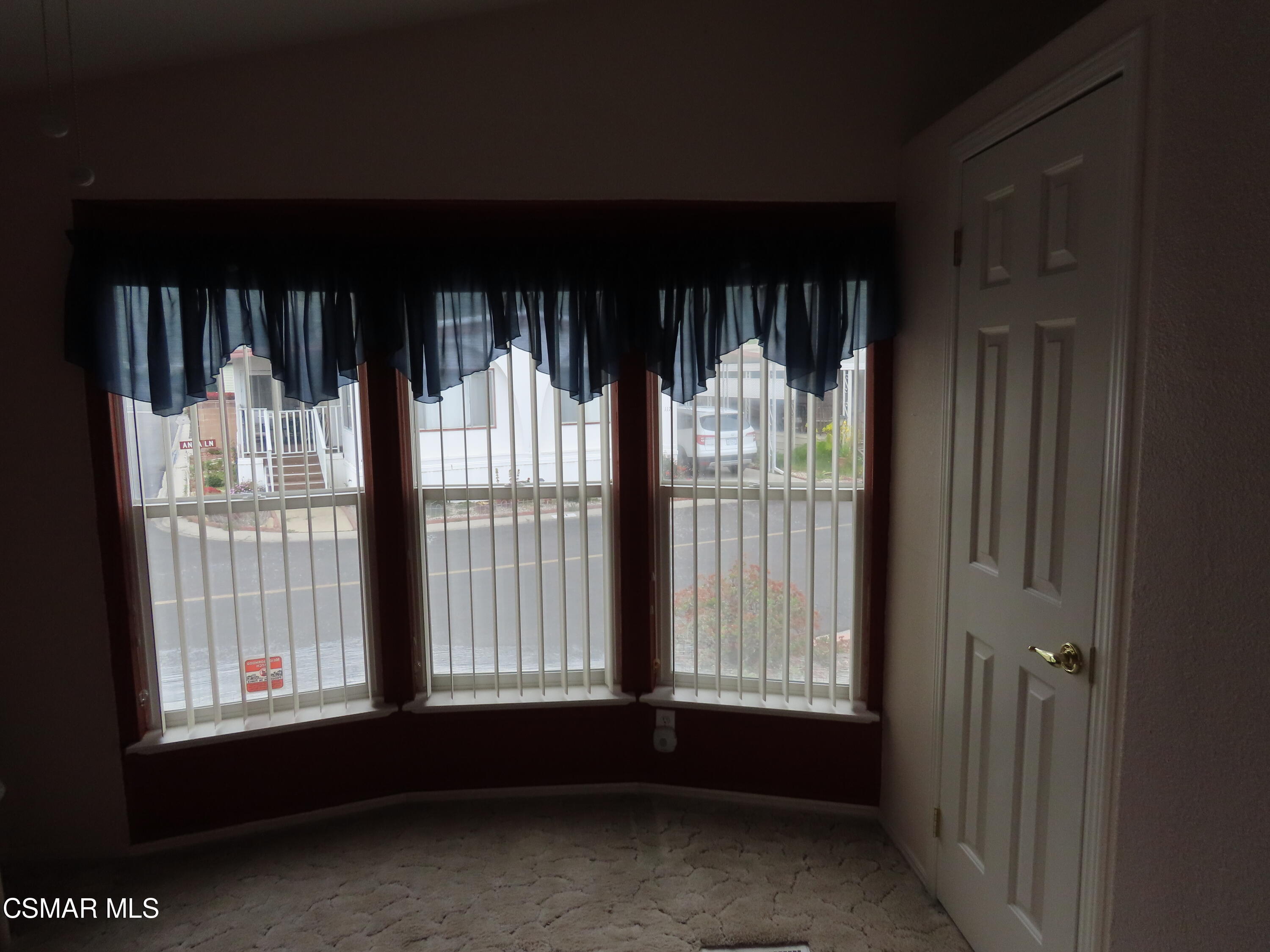 250 East Telegraph Road, Unit 58 Fillmore, CA 93015 - Photo 19 of 29 a view of an empty room with a window