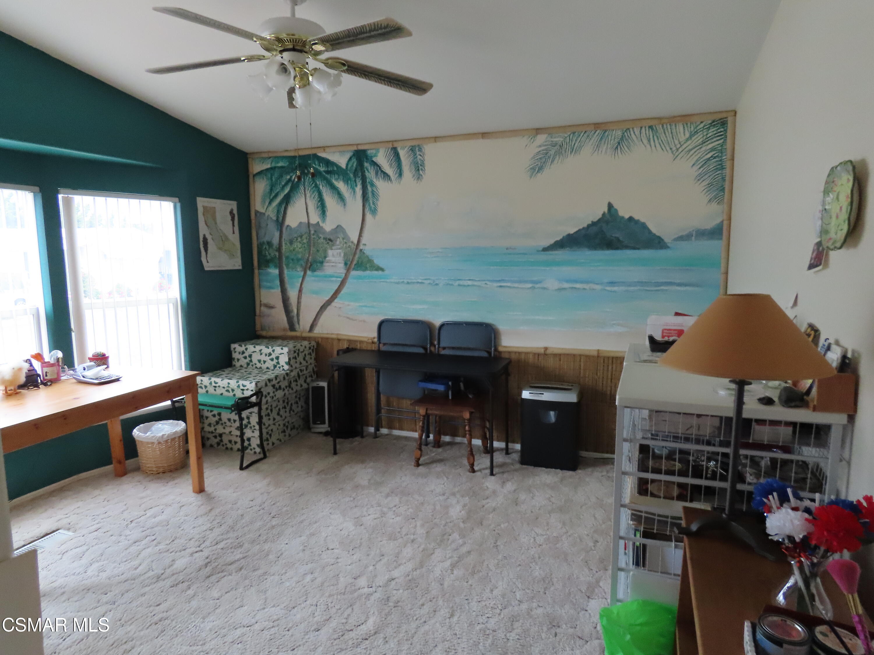 250 East Telegraph Road, Unit 58 Fillmore, CA 93015 - Photo 20 of 29 a room with furniture and a chandelier