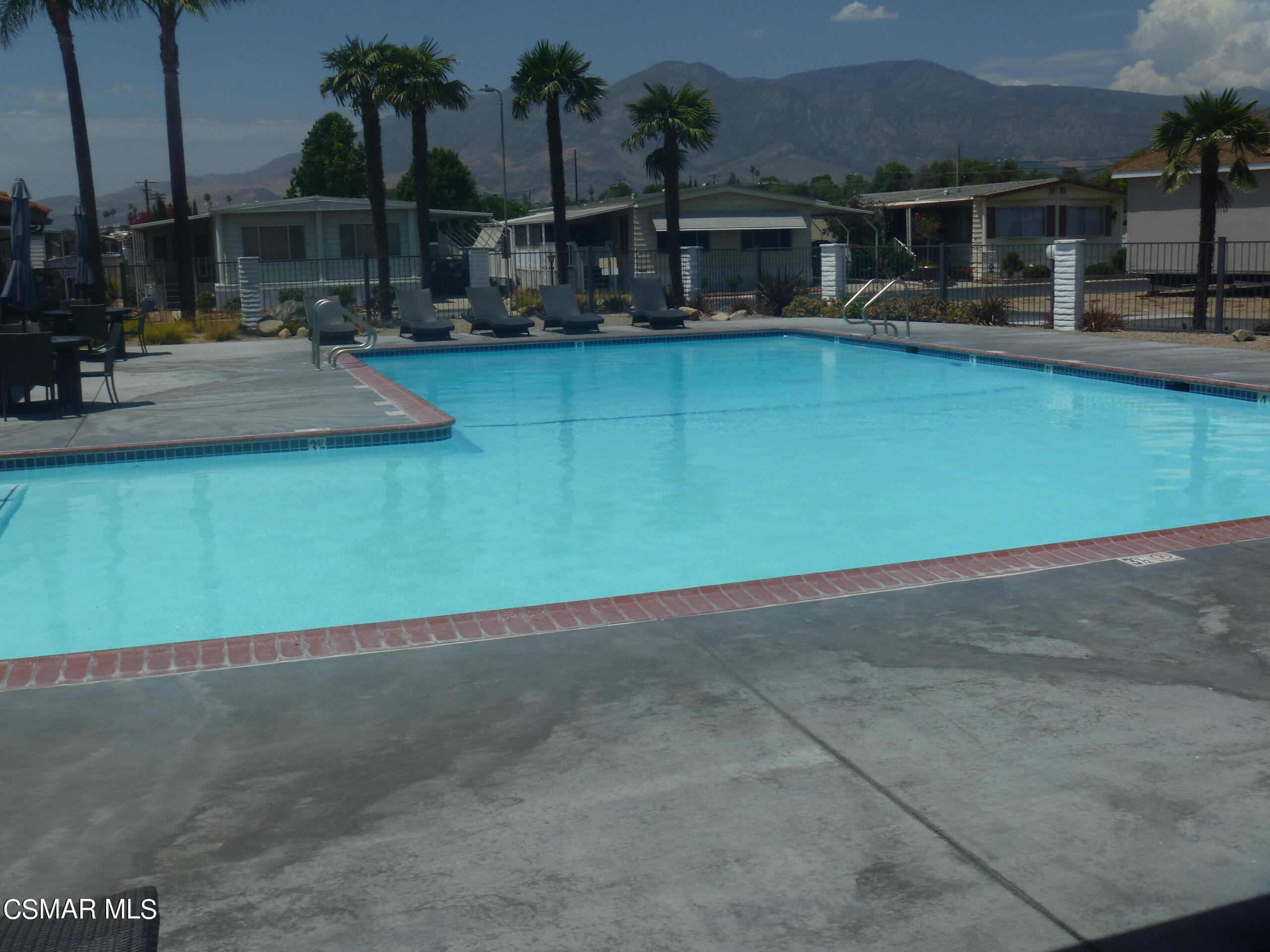250 East Telegraph Road, Unit 58 Fillmore, CA 93015 - Photo 29 of 29 an outdoor space with swimming pool and furniture