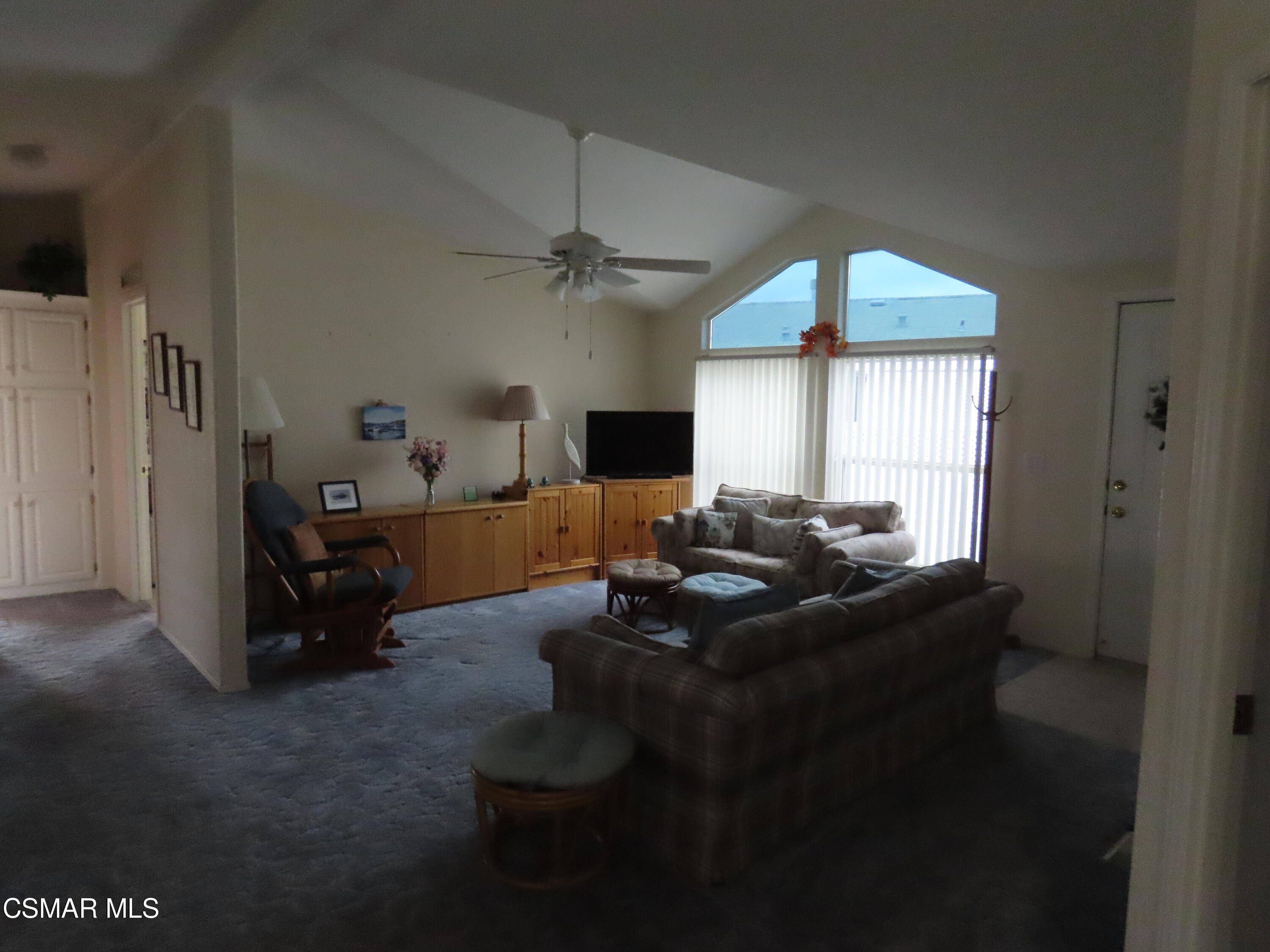 250 East Telegraph Road, Unit 58 Fillmore, CA 93015 - Photo 6 of 29 a living room with furniture and a flat screen tv