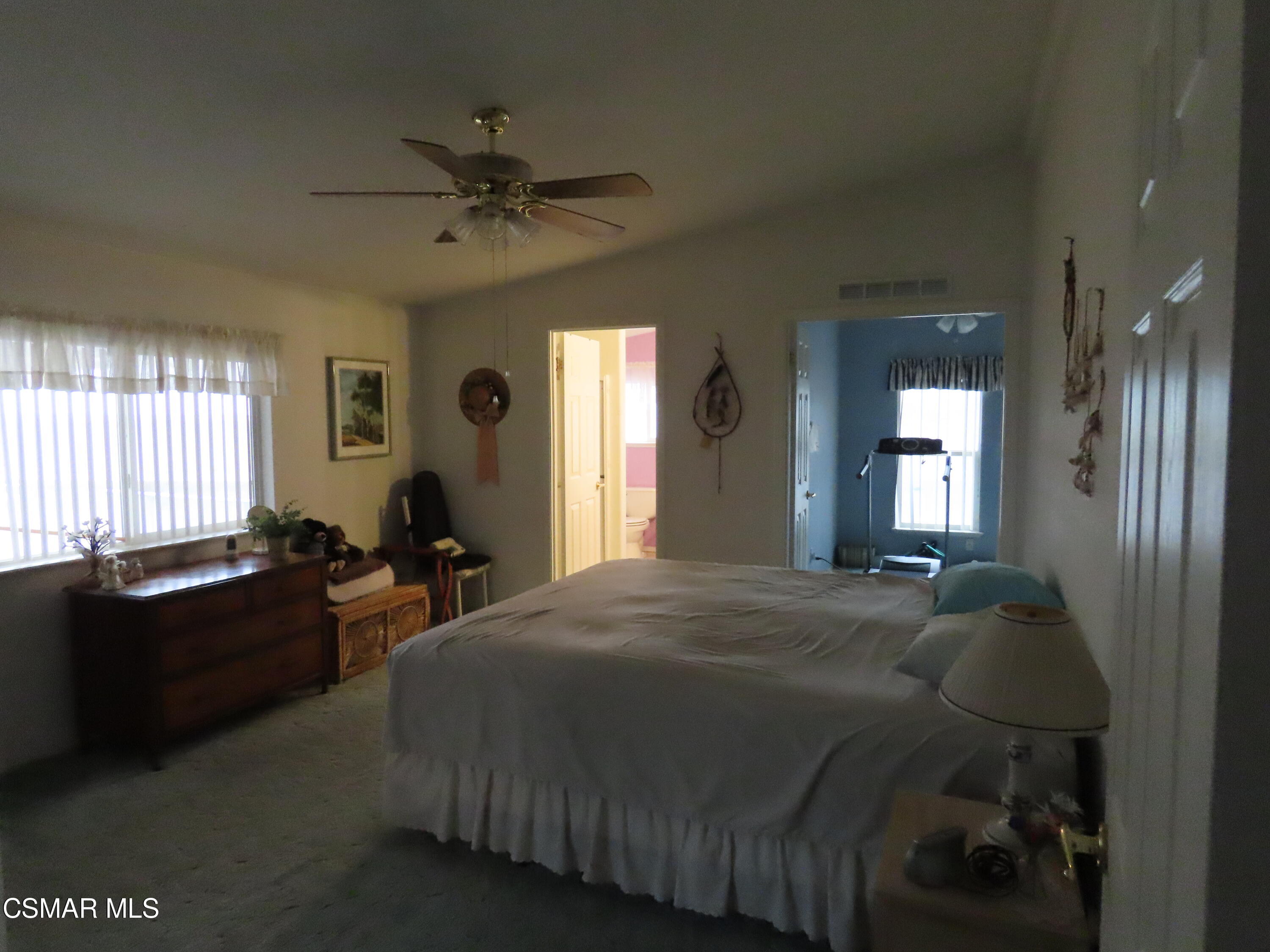 250 East Telegraph Road, Unit 58 Fillmore, CA 93015 - Photo 10 of 29 a bed sitting in a spacious bedroom next to a window