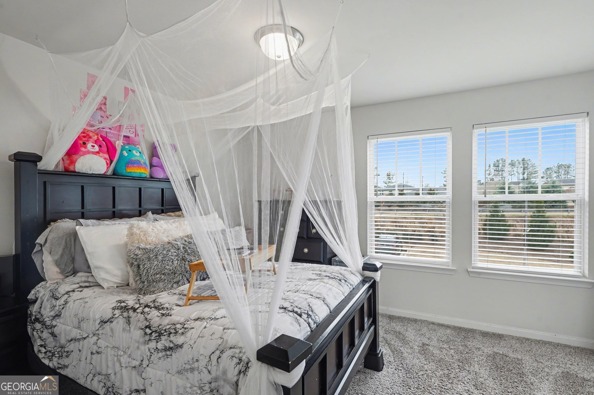 316 Warner Road McDonough, GA 30253 - Photo 16 of 27 a living room with furniture and a window