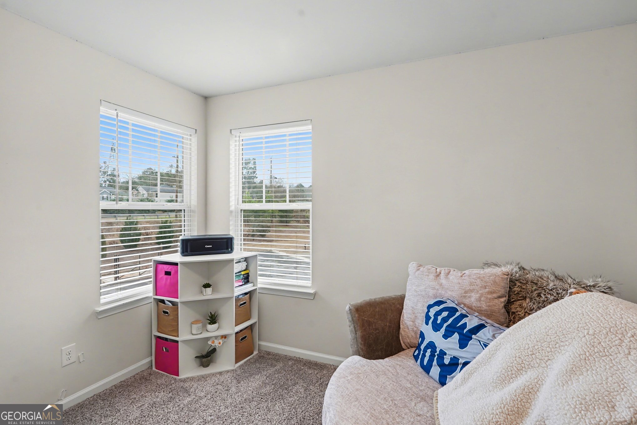 316 Warner Road McDonough, GA 30253 - Photo 20 of 27 a living room with furniture and a window