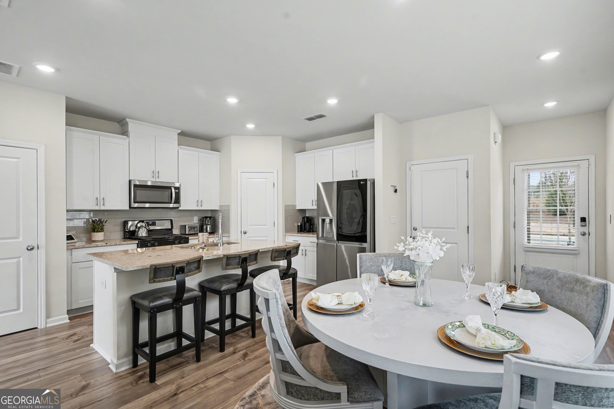 316 Warner Road McDonough, GA 30253 - Photo 2 of 27 a view of a dining room with furniture