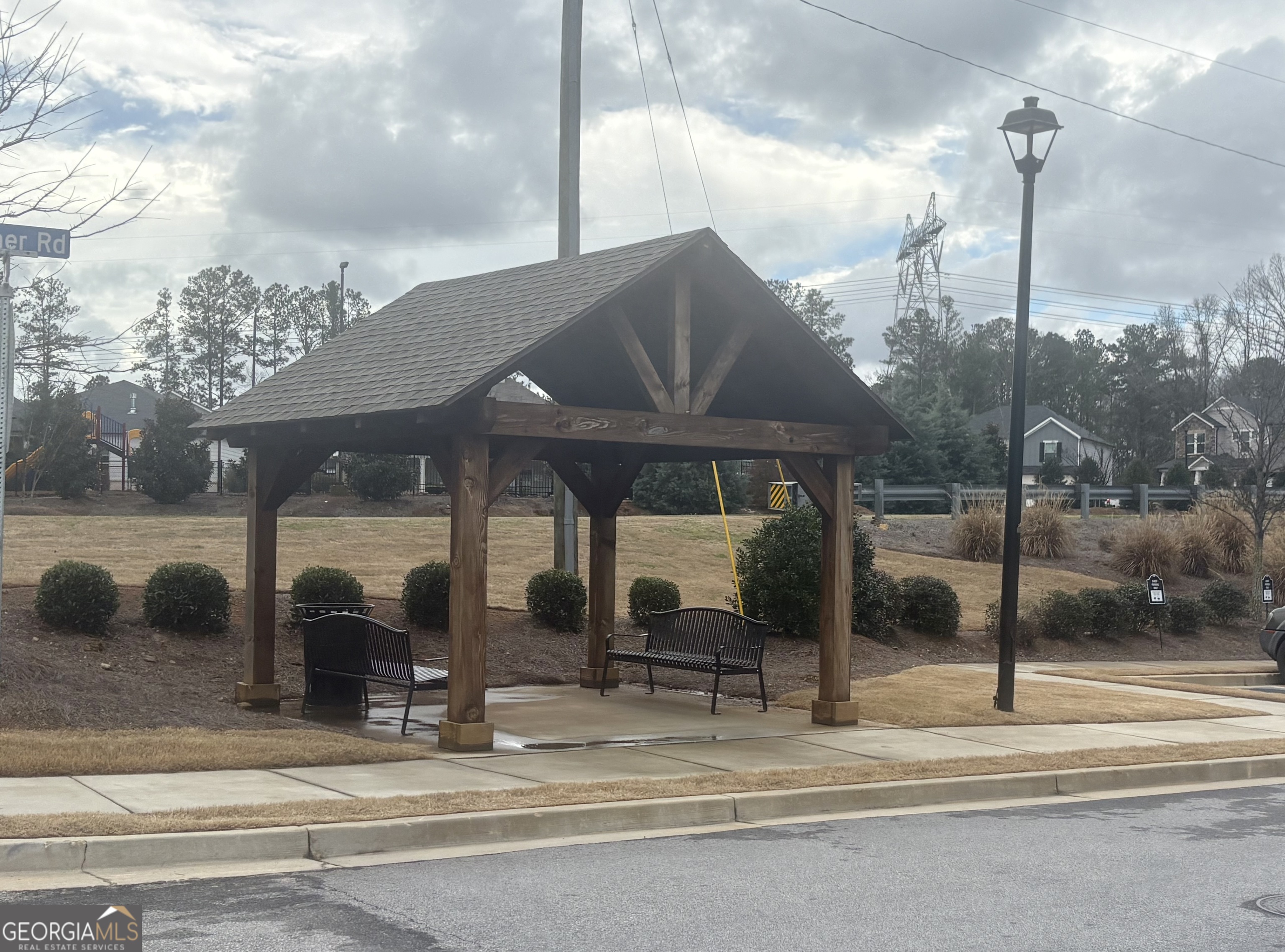 316 Warner Road McDonough, GA 30253 - Photo 24 of 27 a view of a building with a porch