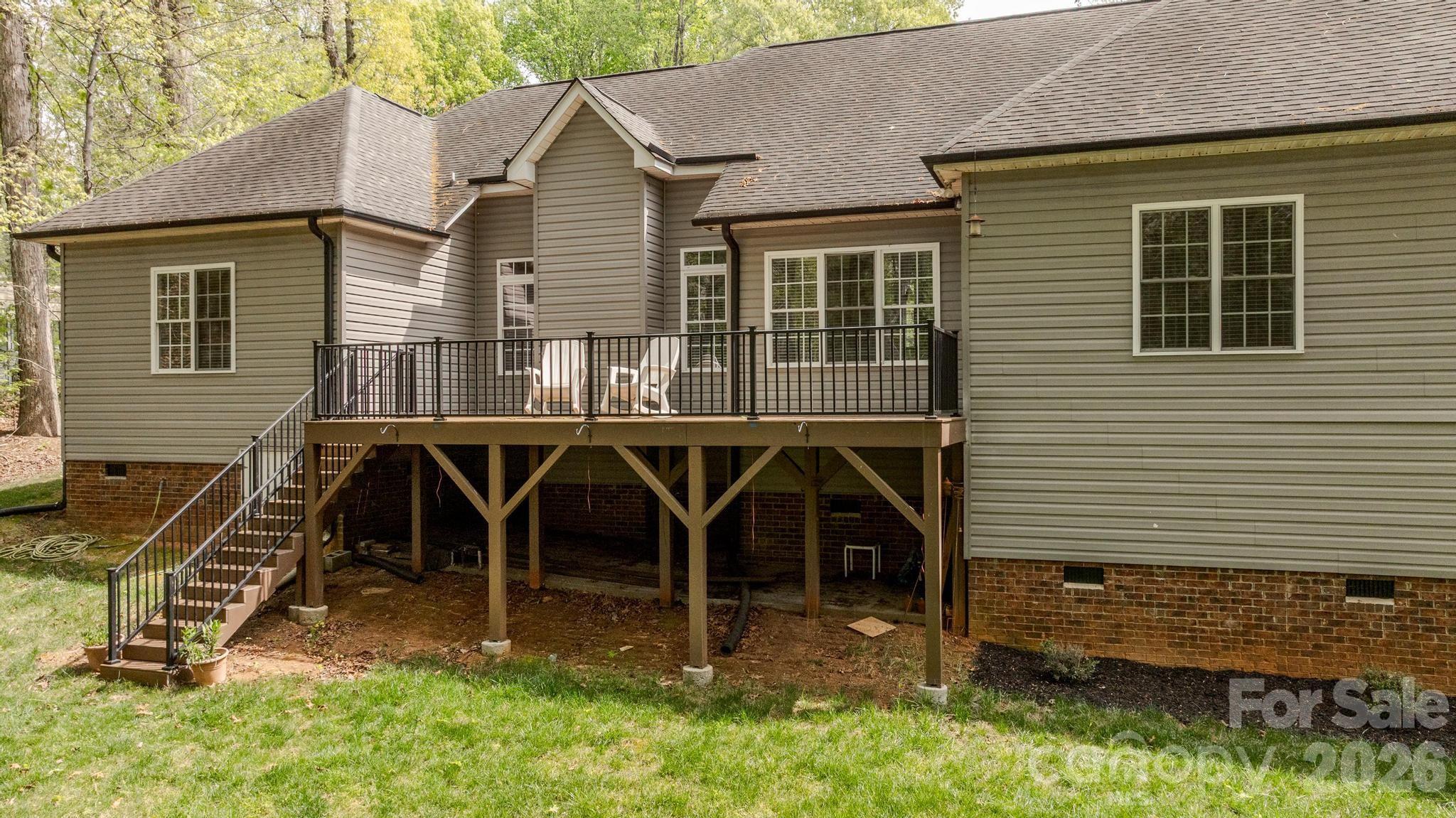 7867 Golf Course Drive North Denver, NC 28037 - Photo 27 of 34 a view of a house with backyard