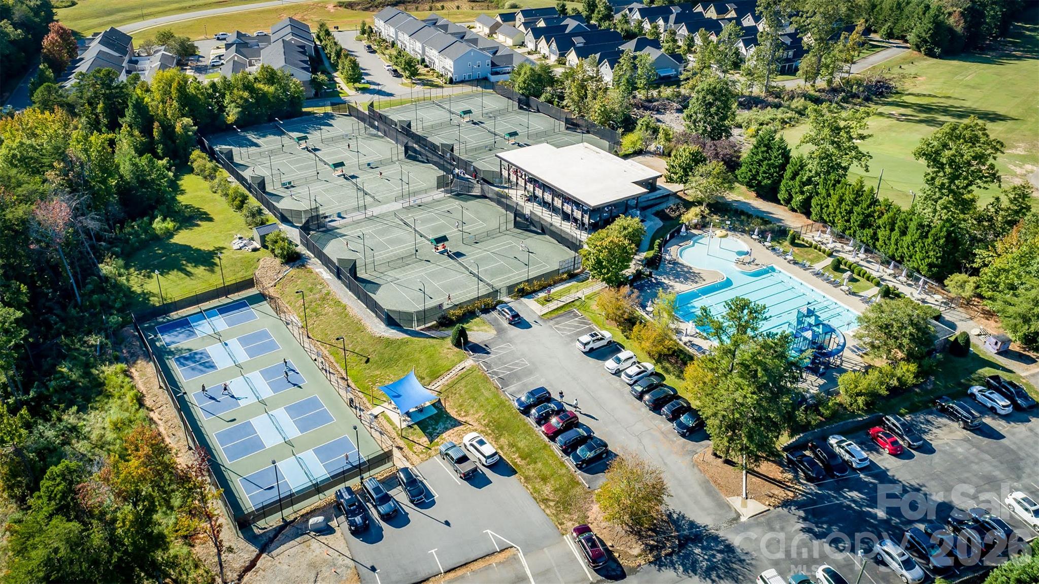 7867 Golf Course Drive North Denver, NC 28037 - Photo 34 of 34 an aerial view of a house with a yard basket ball court and outdoor seating