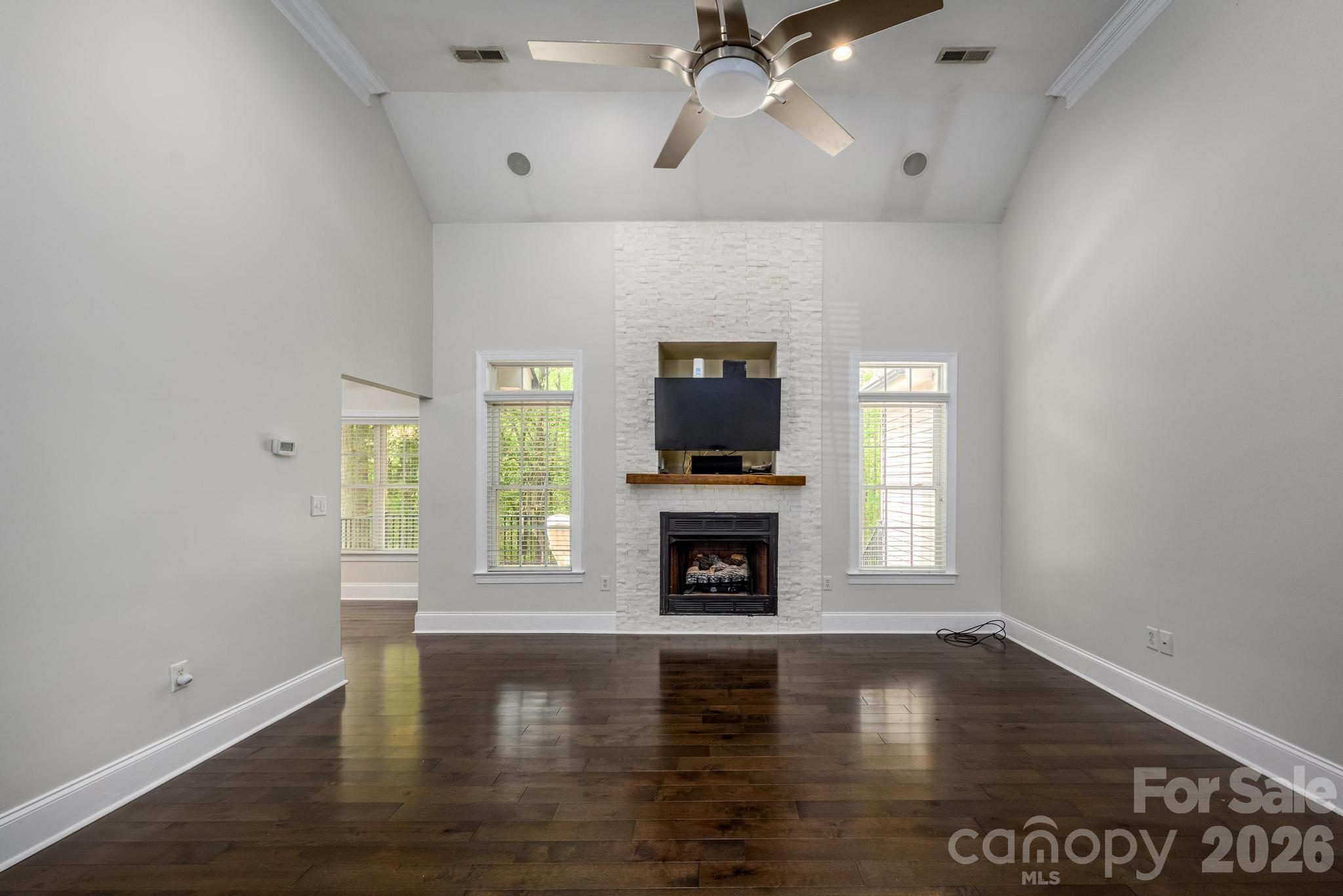 7867 Golf Course Drive North Denver, NC 28037 - Photo 7 of 34 a view of livingroom with furniture flat screen tv and window