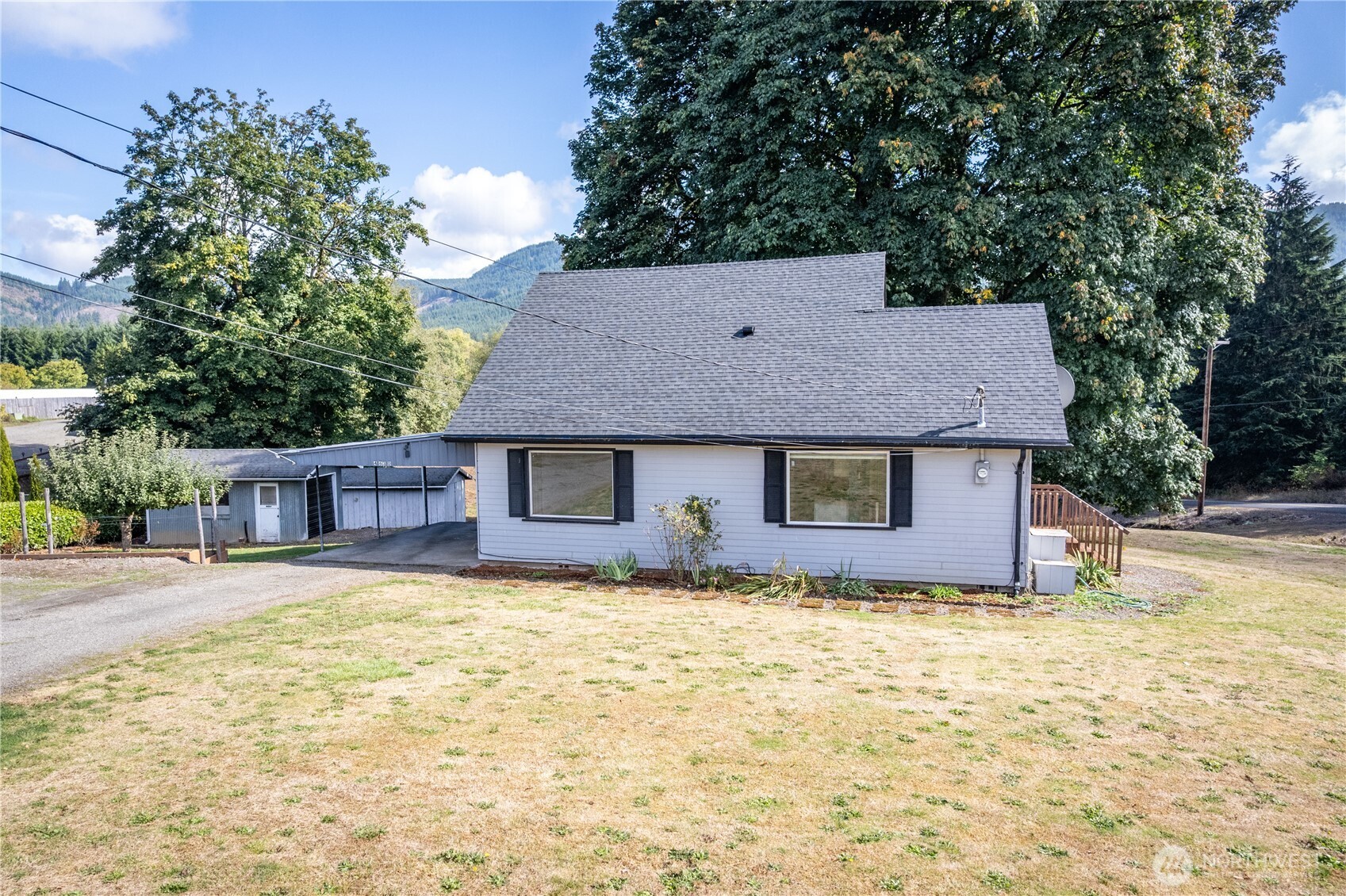 4630 Pleasant Hill Road Kelso, WA 98626 - Photo 3 of 39 a view of a house with a yard