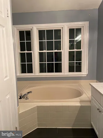 a view of a bathtub in a bathroom