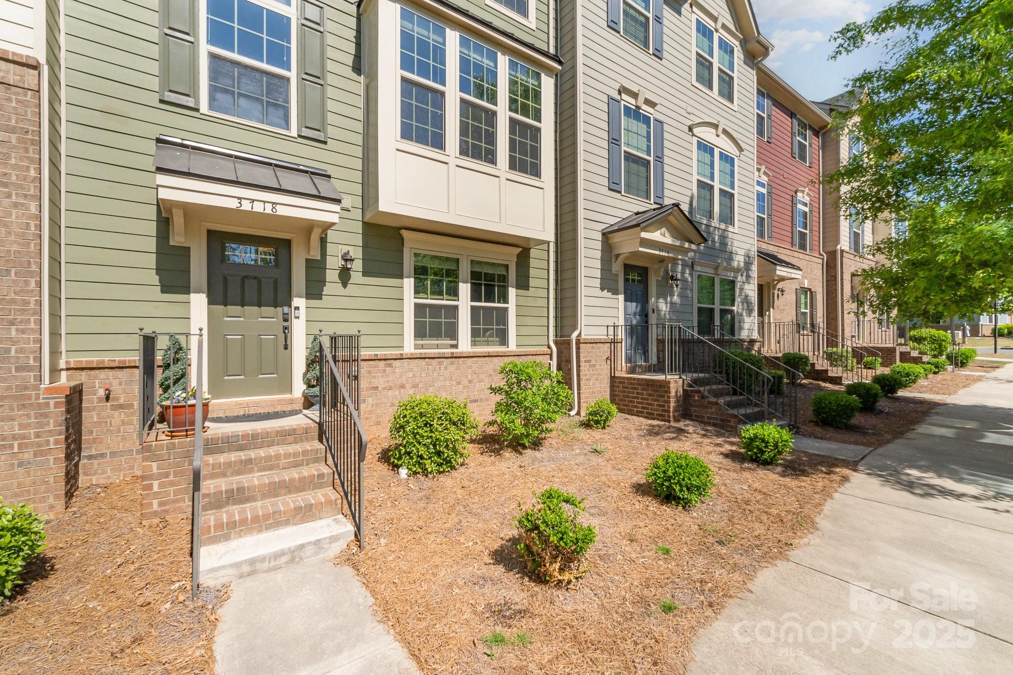 3718 Speer Boulevard Charlotte, NC 28217 - Photo 3 of 48 a front view of a multi story residential apartment building