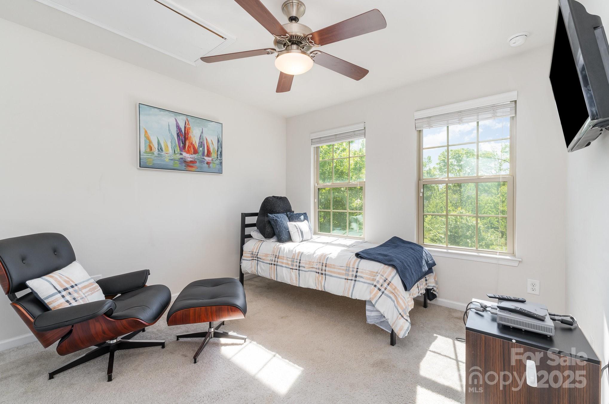 3718 Speer Boulevard Charlotte, NC 28217 - Photo 34 of 48 a living room with furniture and a window
