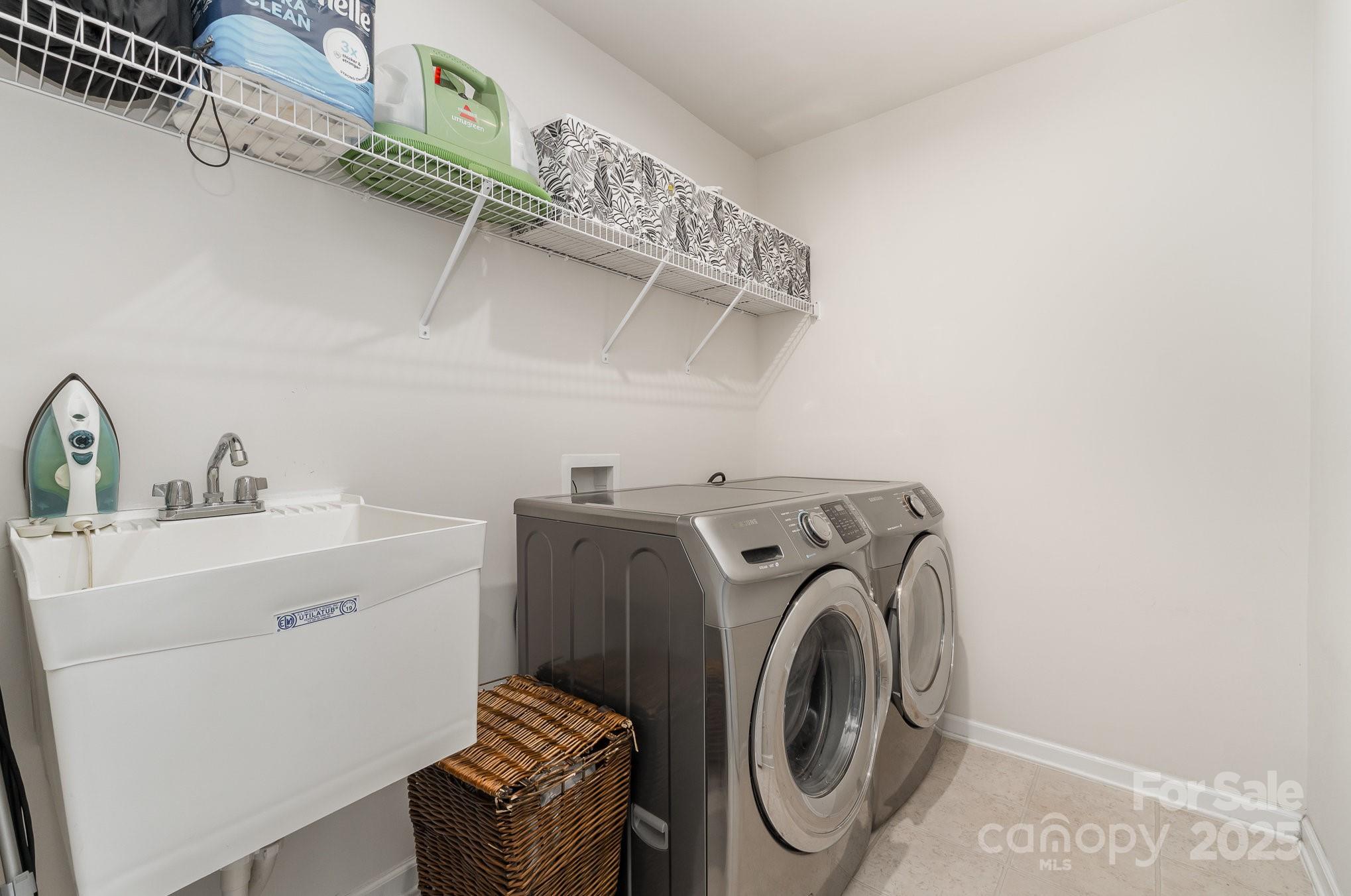 3718 Speer Boulevard Charlotte, NC 28217 - Photo 39 of 48 a utility room with dryer and washer