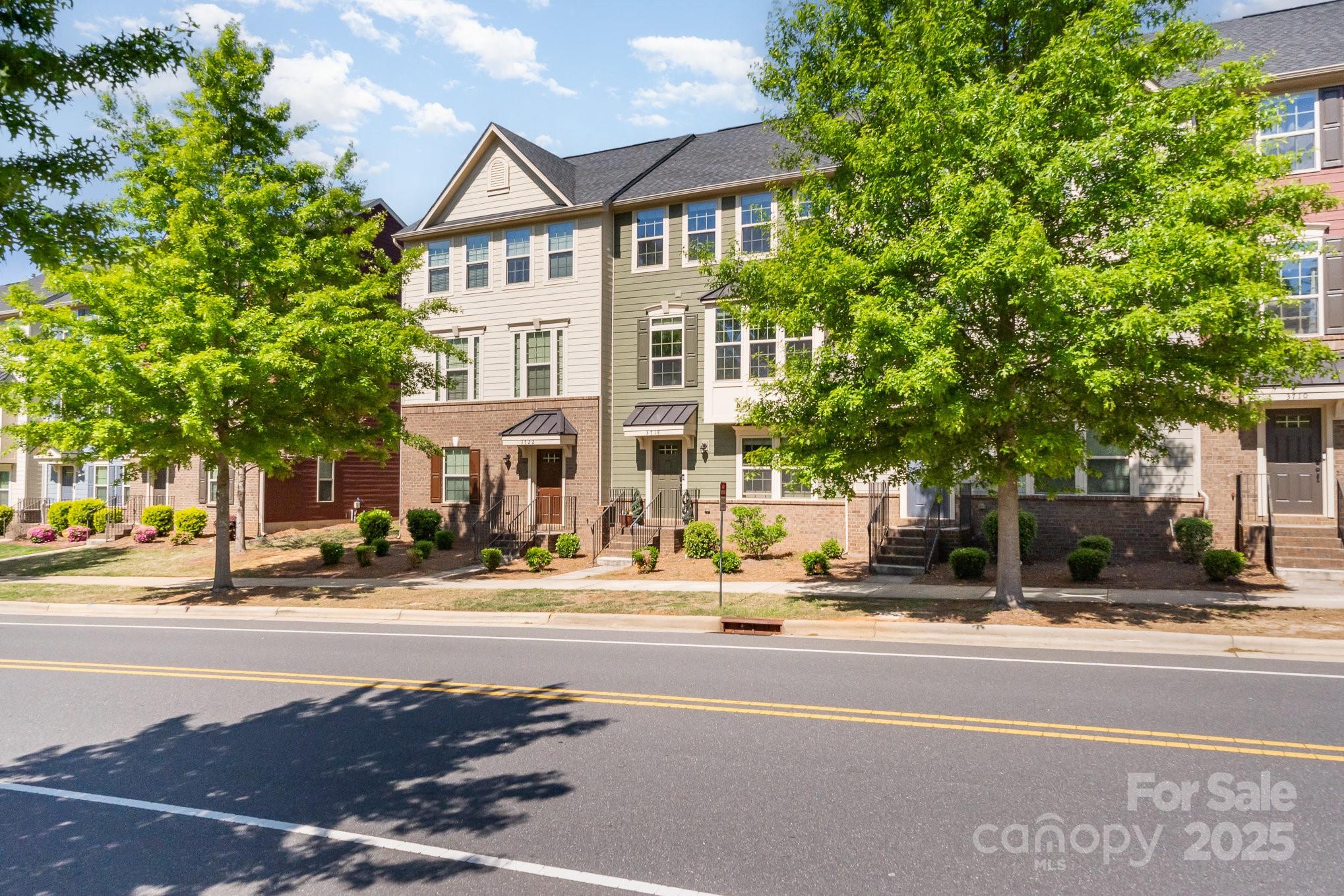 3718 Speer Boulevard Charlotte, NC 28217 - Photo 4 of 48 a view of a building with a street