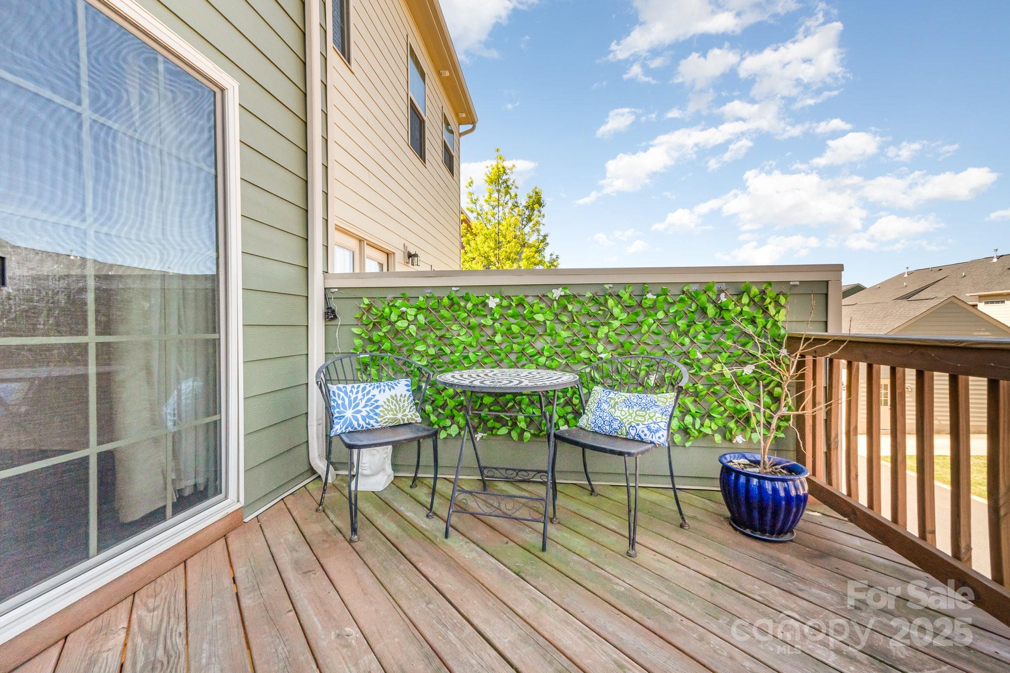 3718 Speer Boulevard Charlotte, NC 28217 - Photo 43 of 48 a view of a chairs and table in the balcony