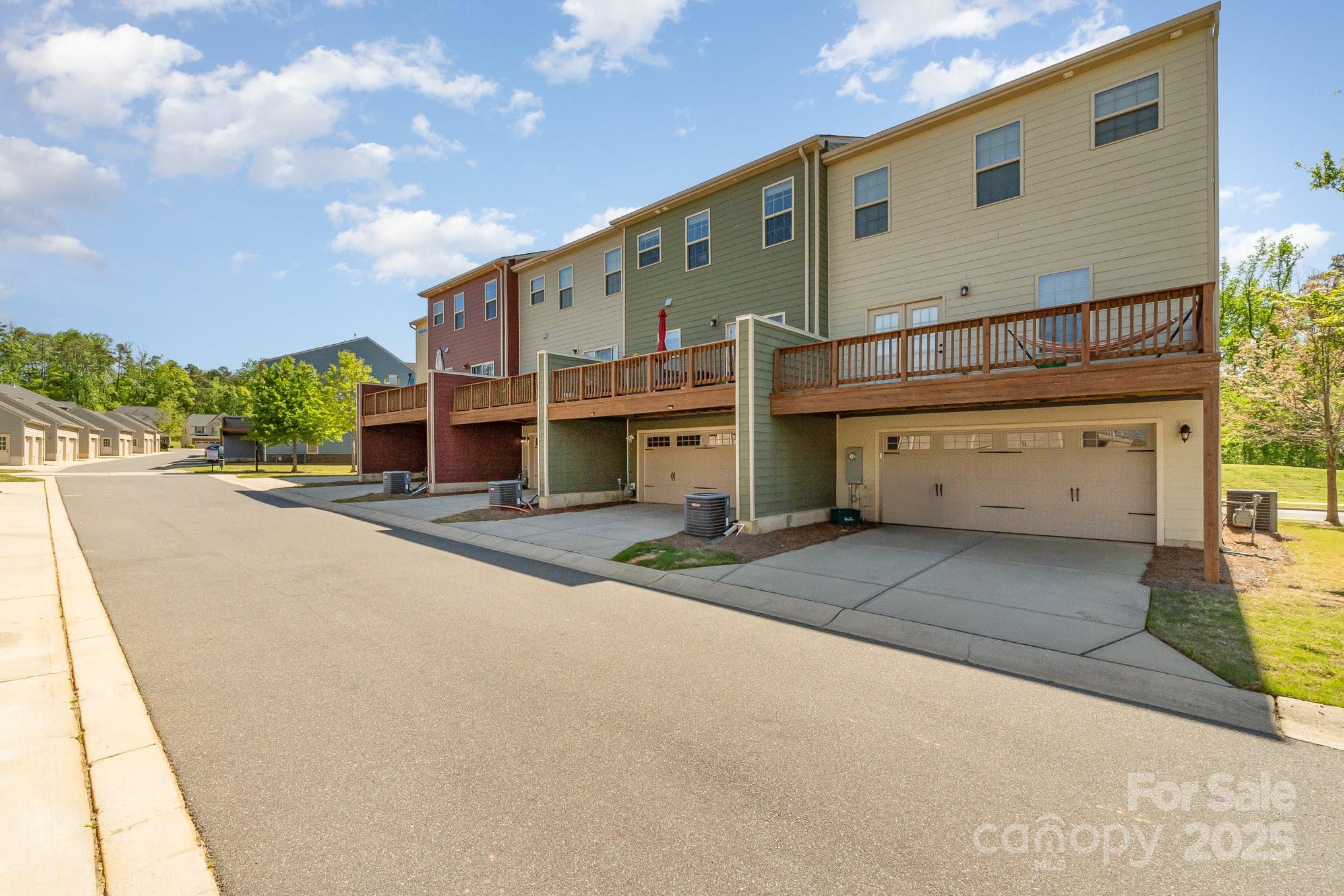 3718 Speer Boulevard Charlotte, NC 28217 - Photo 48 of 48 a view of a street with a building