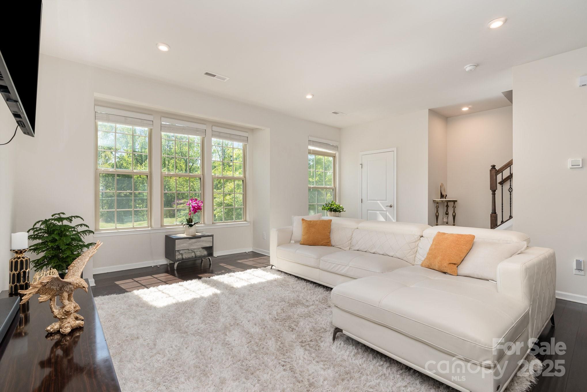 3718 Speer Boulevard Charlotte, NC 28217 - Photo 9 of 48 a living room with furniture and a large window