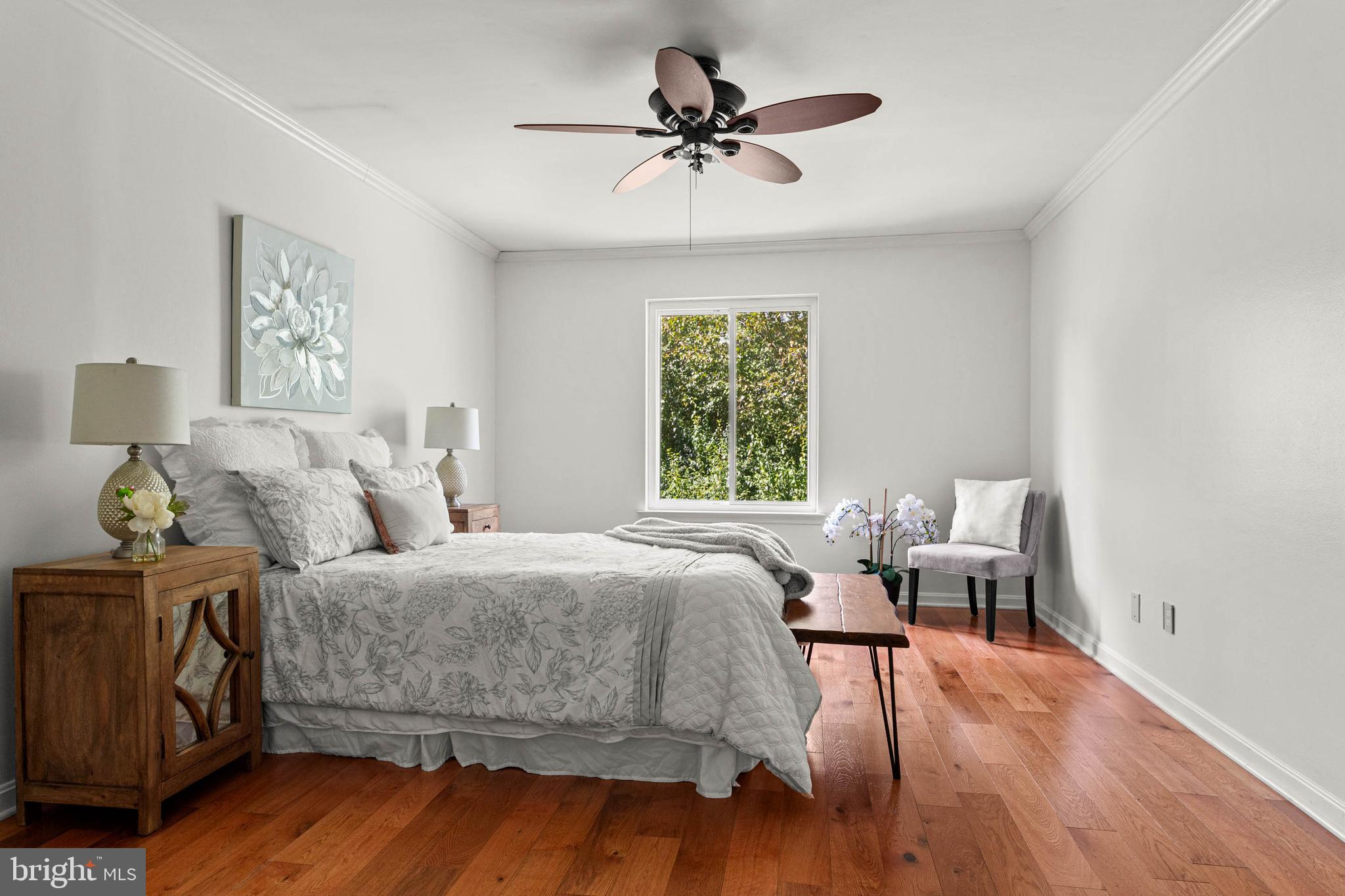 106 Bernard Court Chesterbrook, PA 19087 - Photo 14 of 30 a bedroom with a bed and a chandelier