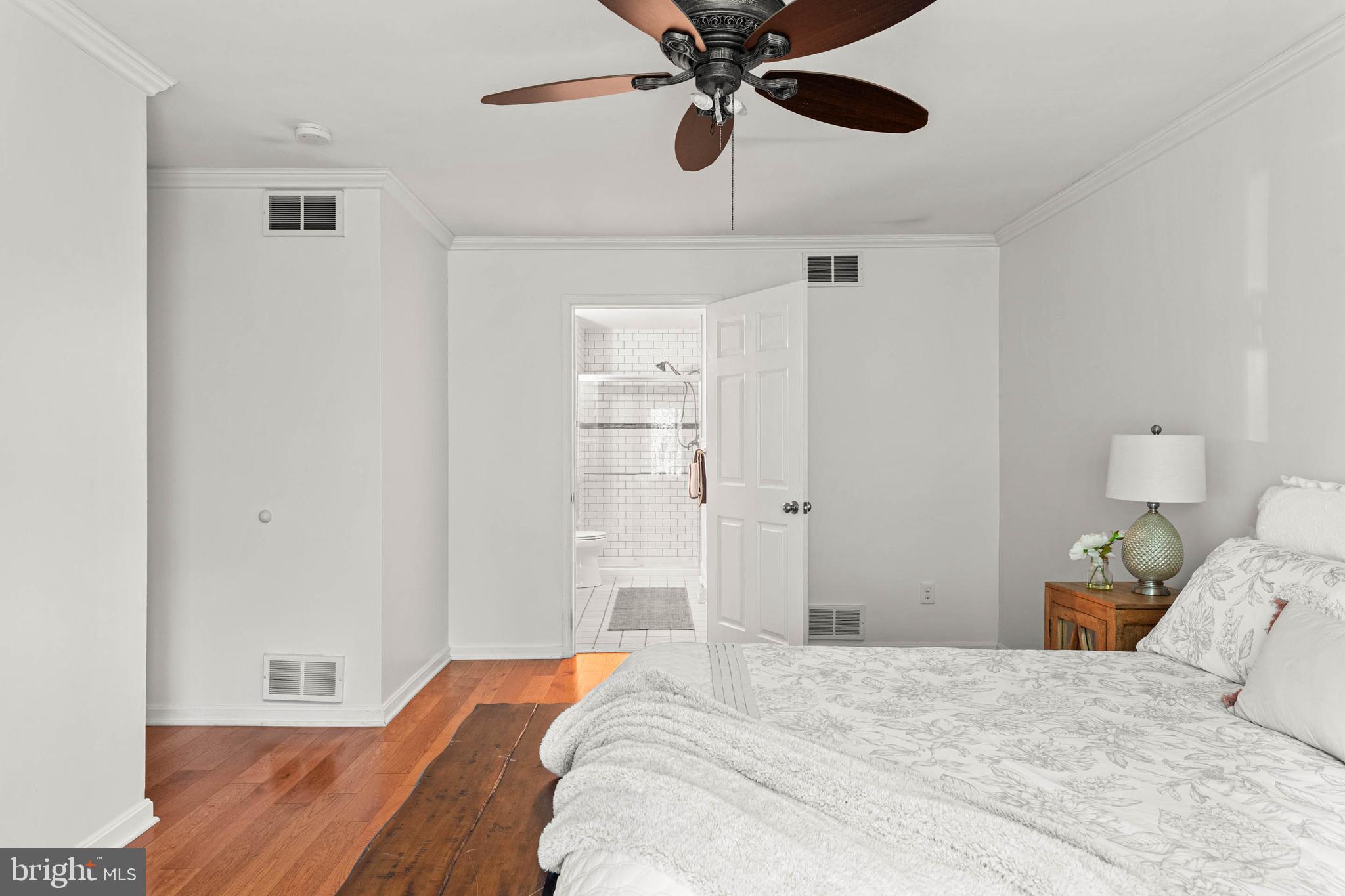 106 Bernard Court Chesterbrook, PA 19087 - Photo 15 of 30 a bedroom with a bed and a chandelier