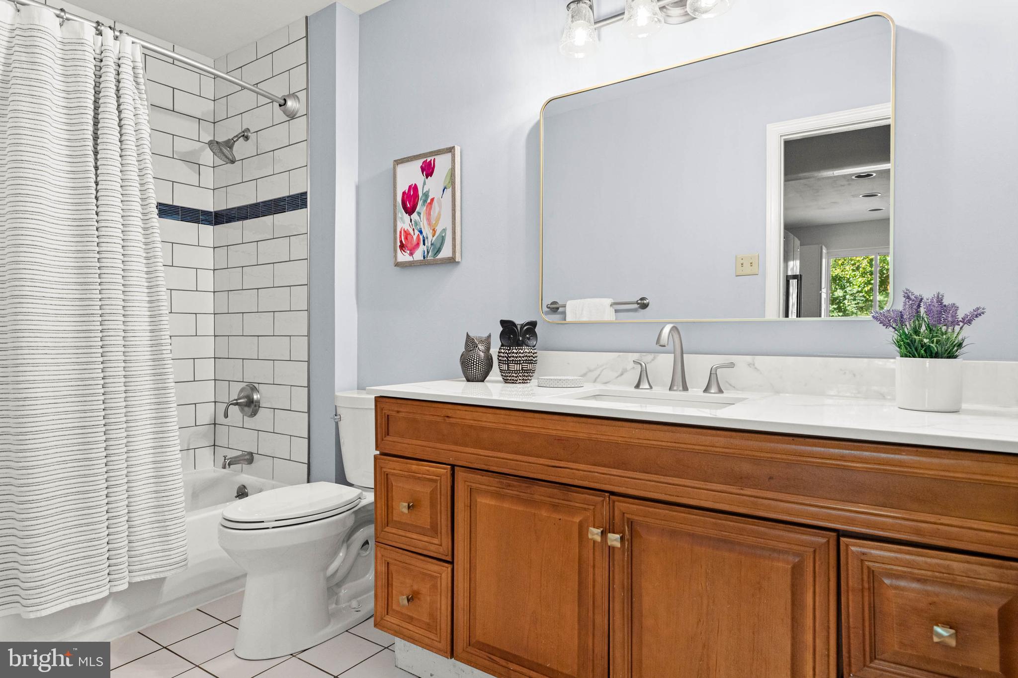 106 Bernard Court Chesterbrook, PA 19087 - Photo 23 of 30 a bathroom with a sink a toilet and shower