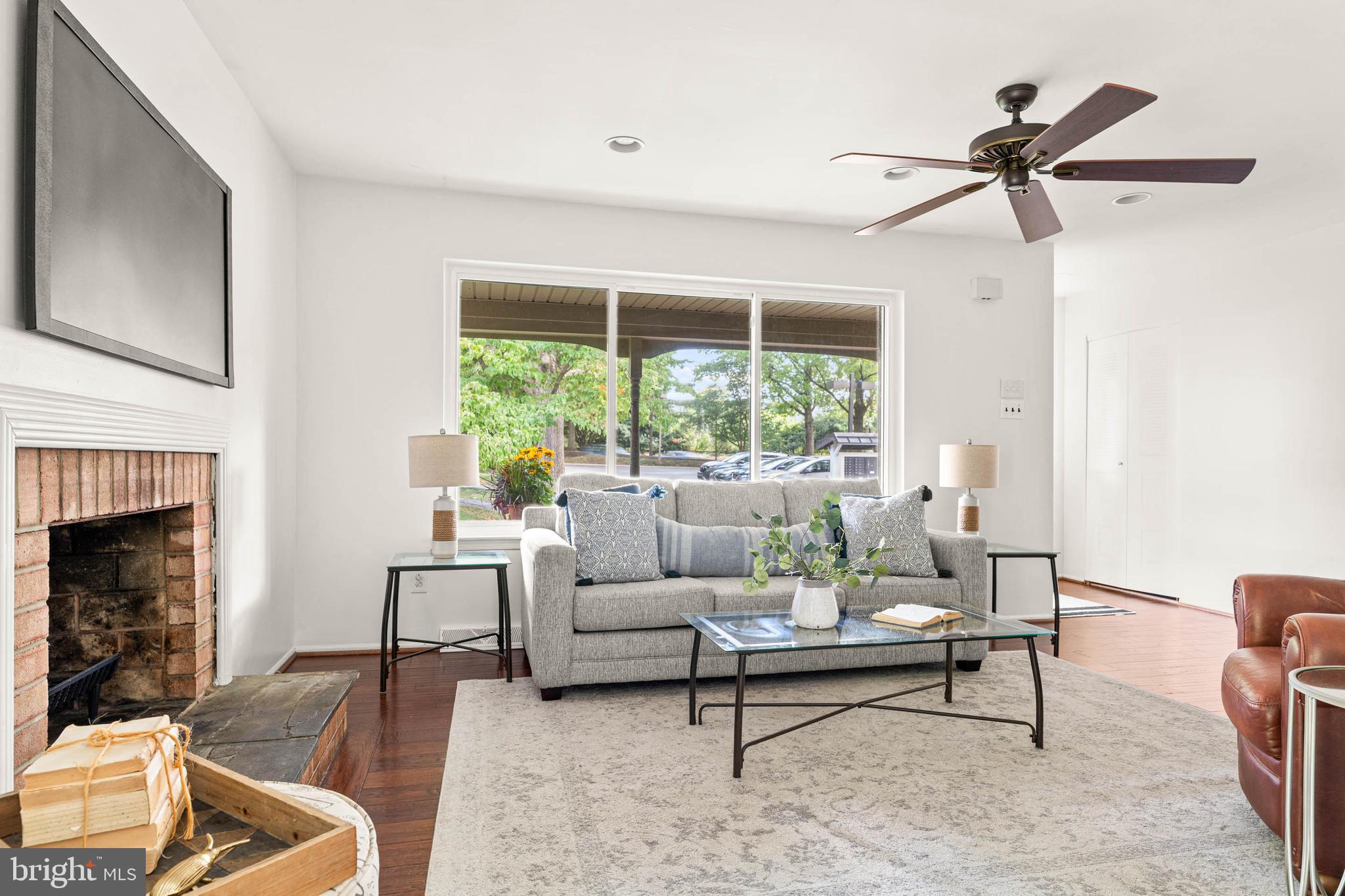 106 Bernard Court Chesterbrook, PA 19087 - Photo 6 of 30 a living room with furniture and a fireplace