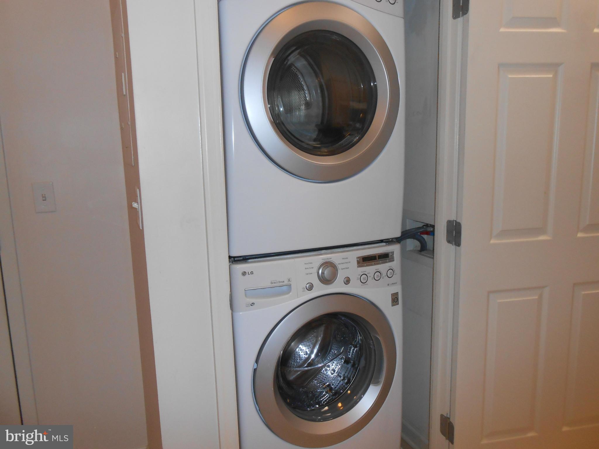 2726 Gallows Road, Unit 112 Vienna, VA 22180 - Photo 17 of 27 a close up view of a washer and dryer