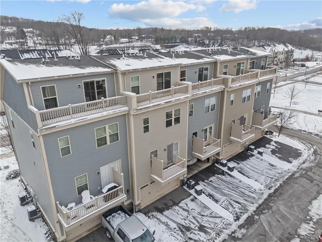 a view of city with tall buildings