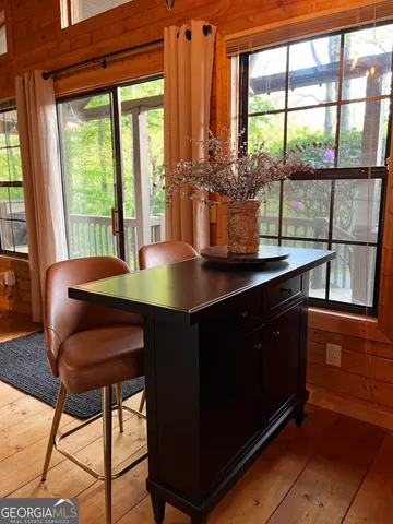 a bedroom with a bed and a lamp