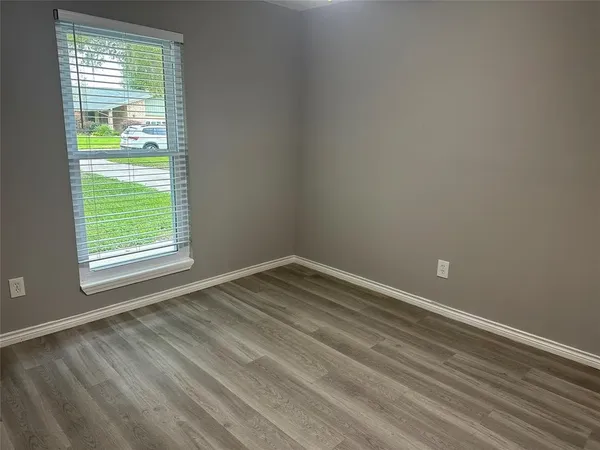a view of a room that has a window