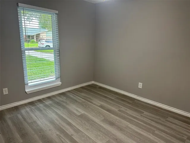 a view of a room that has a window