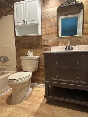 a bathroom with a sink and a toilet