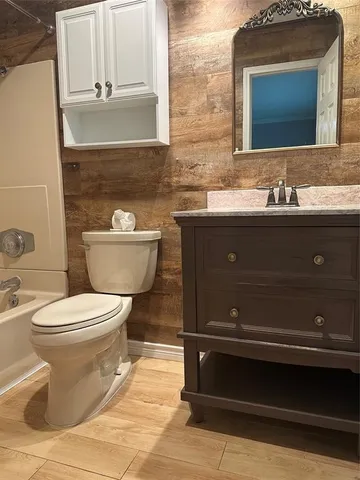 a bathroom with a sink and a toilet