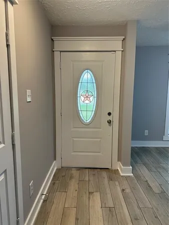 a view of an entryway with a window