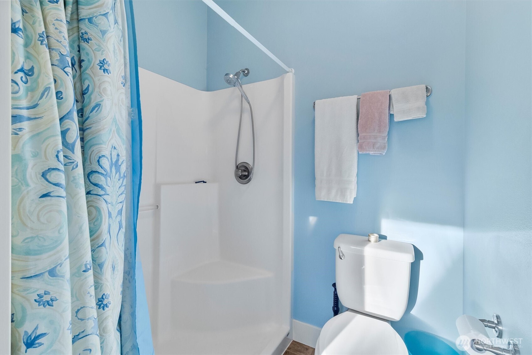 5434 Blue Sky Way Ferndale, WA 98248 - Photo 19 of 39 a white toilet sitting next to a bathroom sink