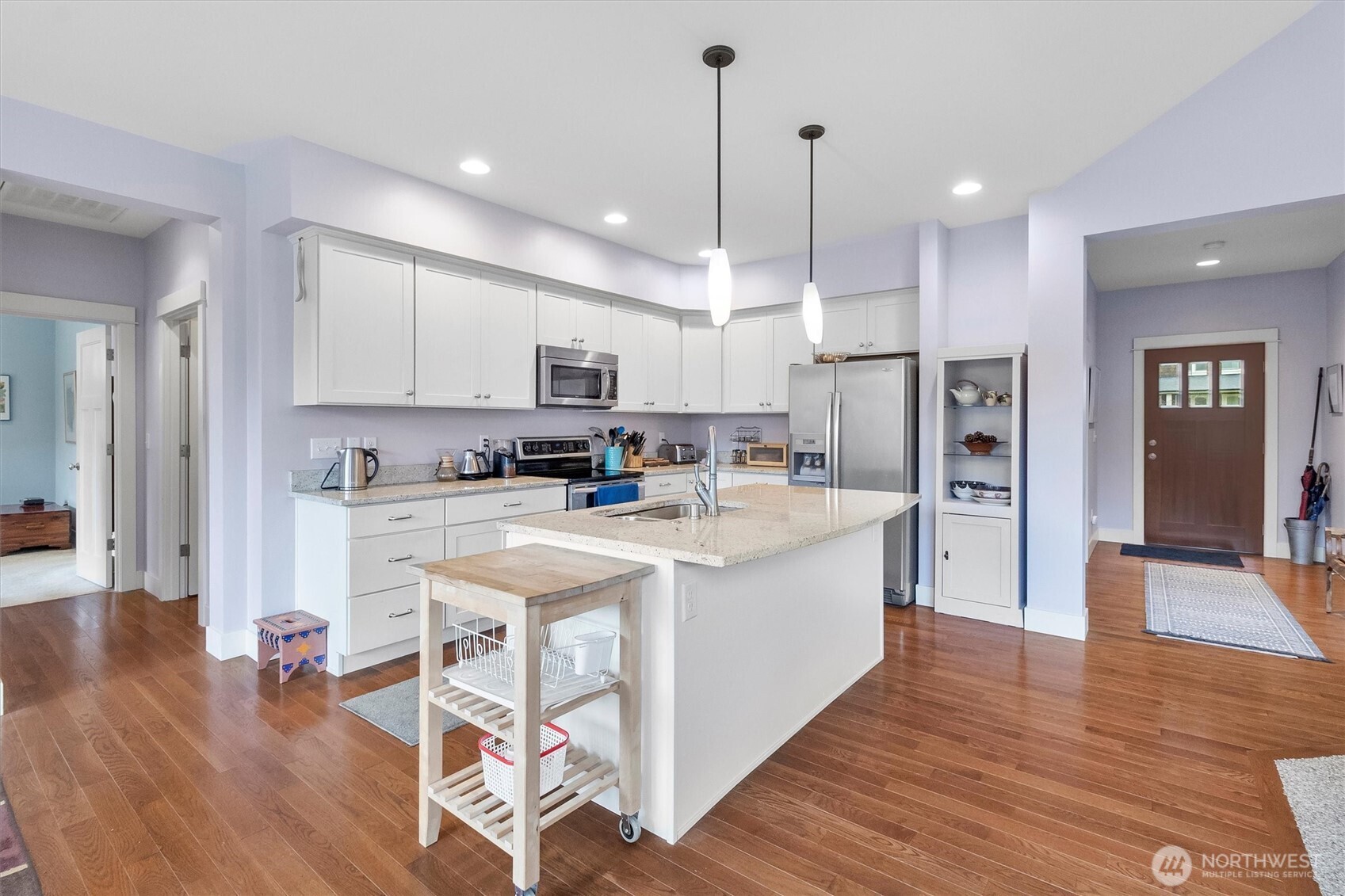 5434 Blue Sky Way Ferndale, WA 98248 - Photo 3 of 39 a view of kitchen with stainless steel appliances refrigerator stove microwave and cabinets