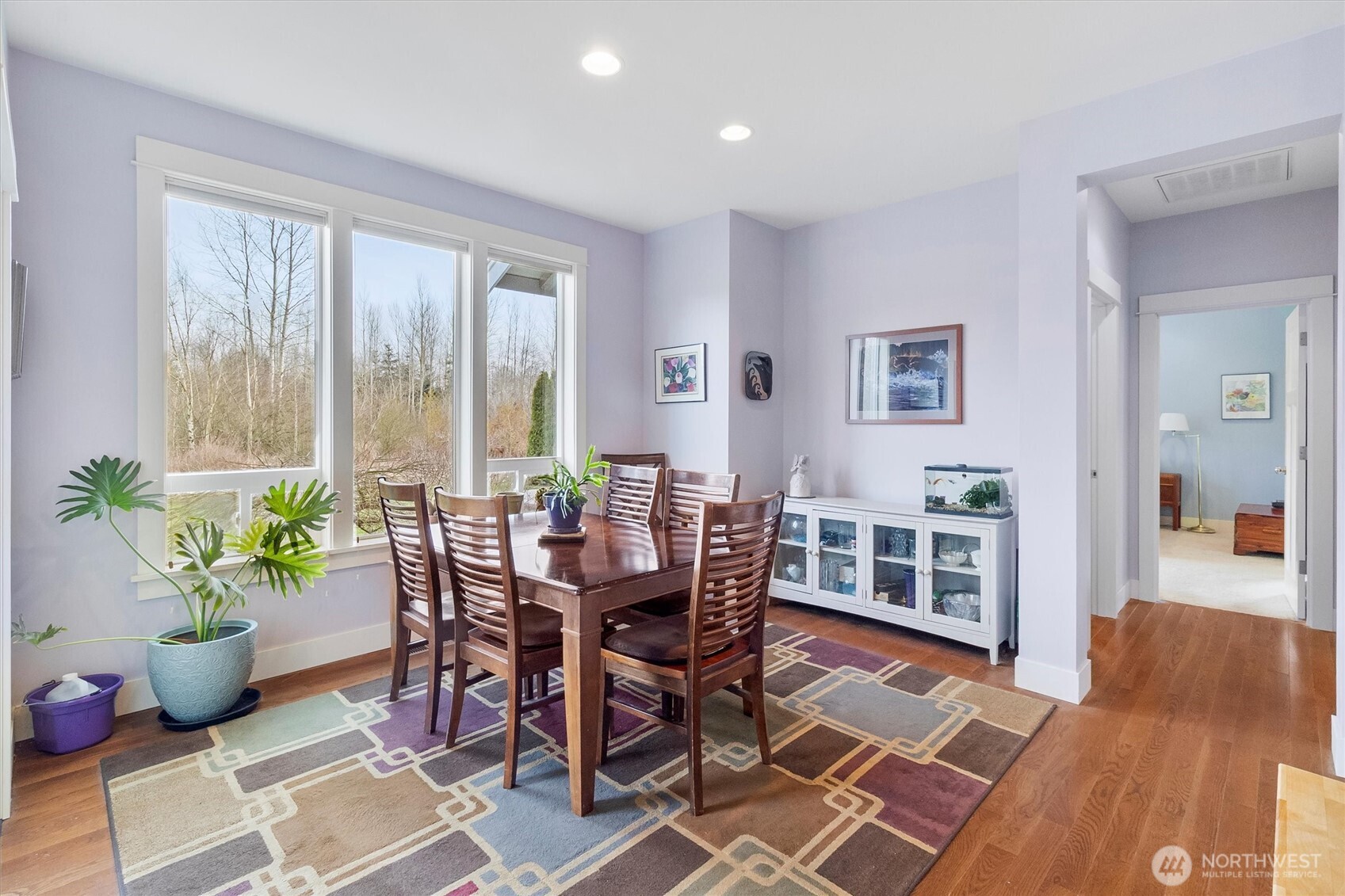 5434 Blue Sky Way Ferndale, WA 98248 - Photo 7 of 39 a view of a dining room with furniture window and wooden floor