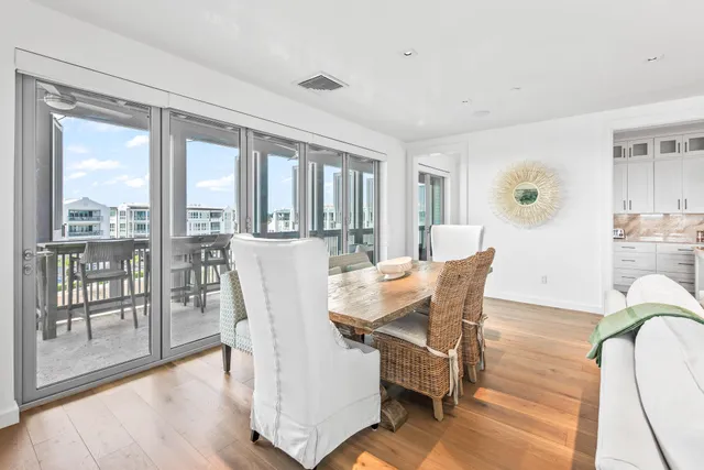 a dining room with furniture window wooden floor