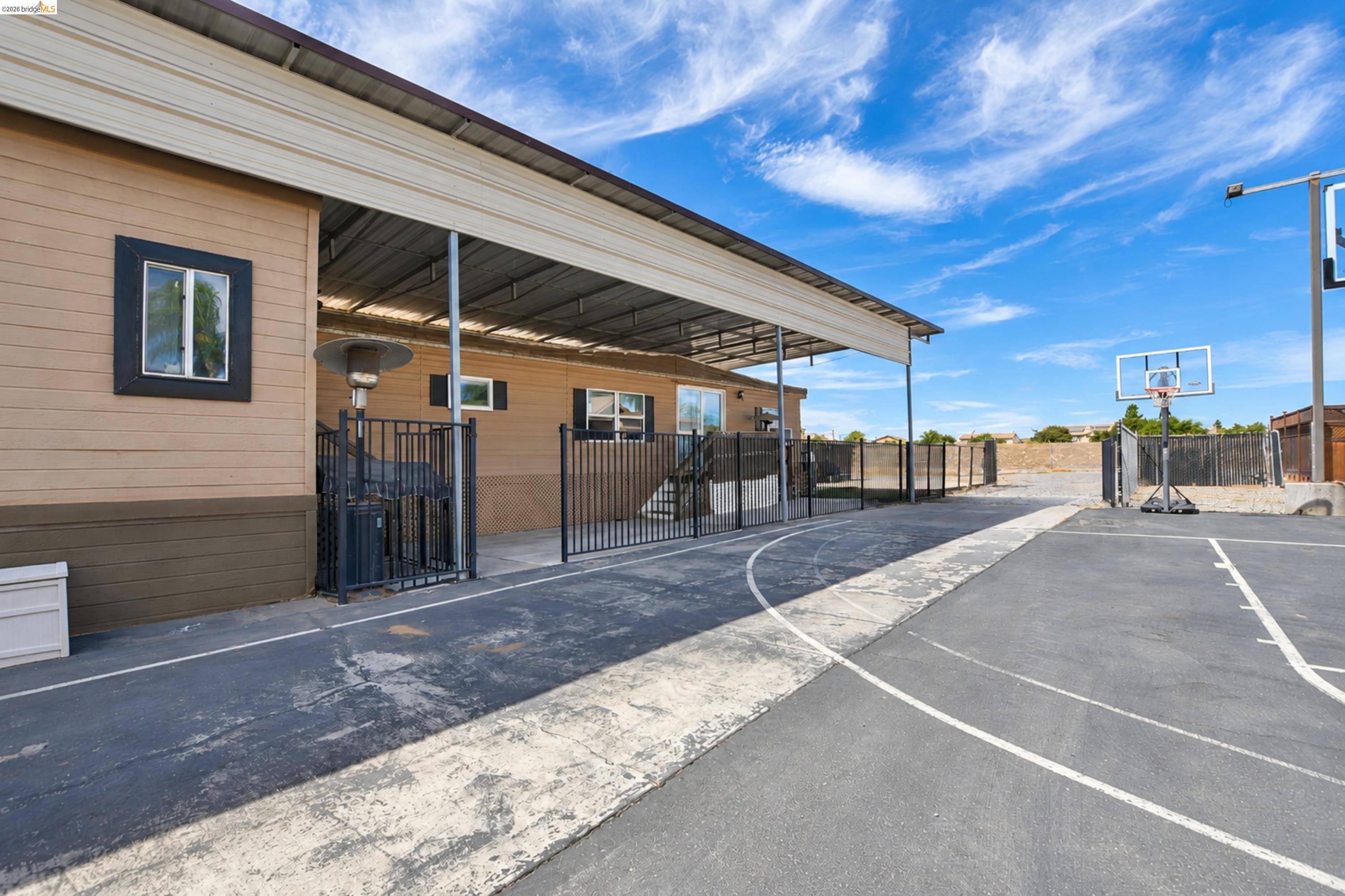 340 West Bolton Road Oakley, CA 94561 - Photo 75 of 87 Paved sports court with painted lines and a basketball hoop