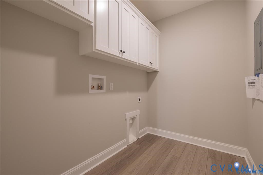 2223 Ridge Road Arvonia, VA 23004 - Photo 29 of 32 Dedicated laundry space featuring overhead white s