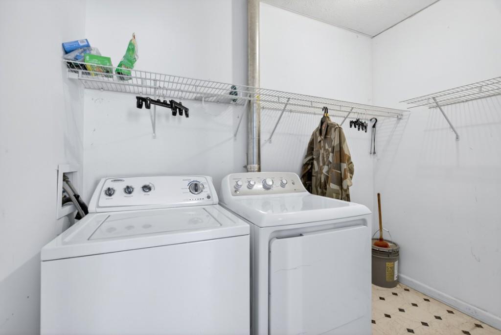 701 Muirfield Drive Winder, GA 30680 - Photo 20 of 35 a utility room with dryer and washer