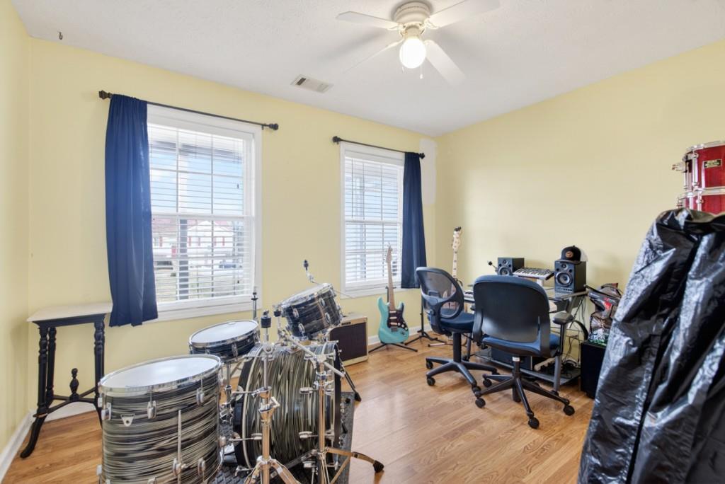 701 Muirfield Drive Winder, GA 30680 - Photo 21 of 35 a view of a livingroom with workspace and a window