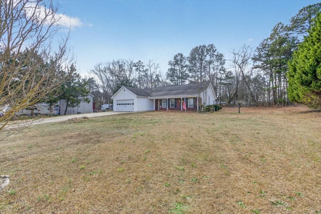701 Muirfield Drive Winder, GA 30680 - Photo 4 of 35 a house view with a outdoor space