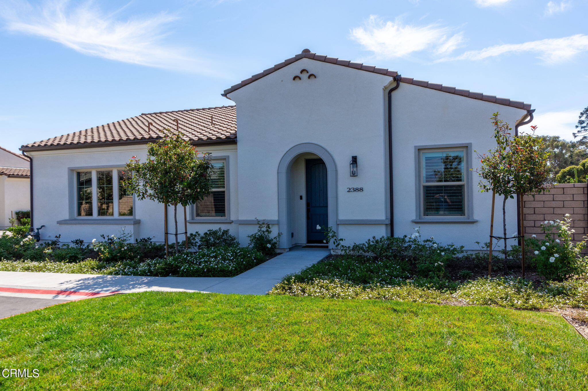 2388 Rondell Road Camarillo, CA 93012 - Photo 1 of 39 a front view of a house with a yard