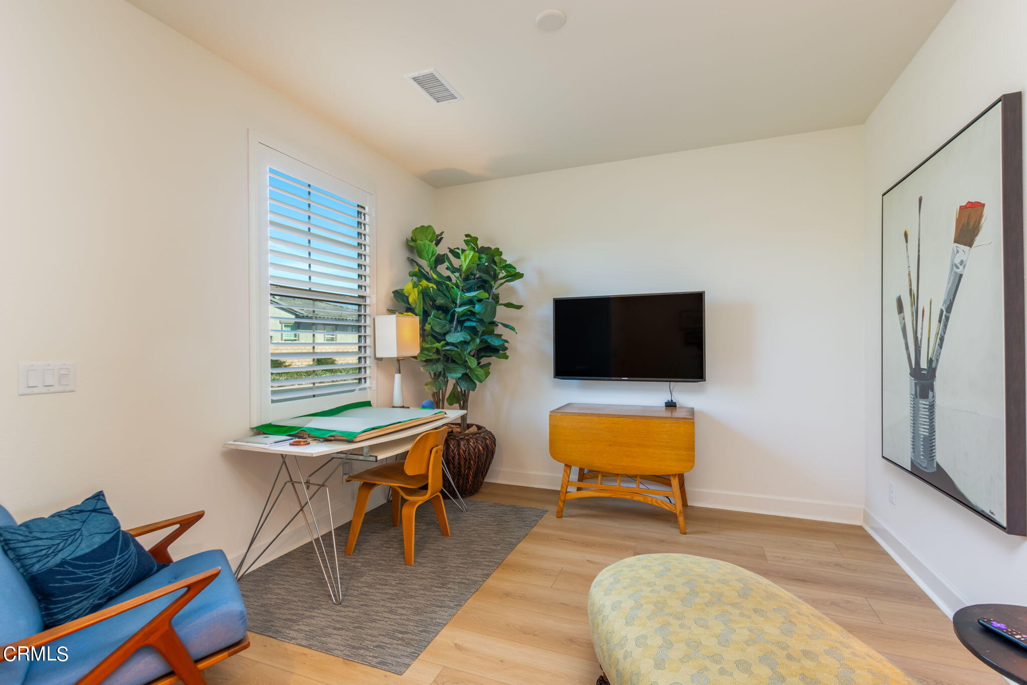 2388 Rondell Road Camarillo, CA 93012 - Photo 3 of 39 a living room with furniture and a flat screen tv