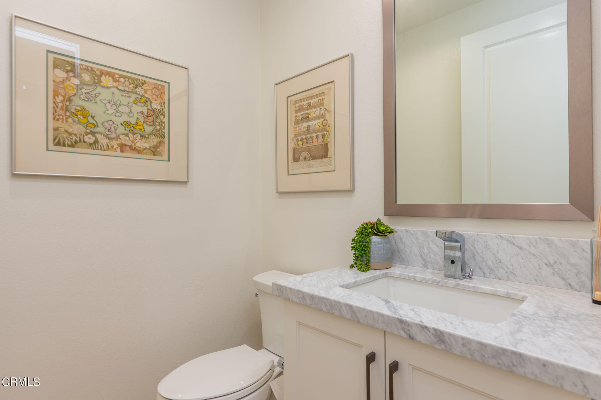 2388 Rondell Road Camarillo, CA 93012 - Photo 4 of 39 a bathroom with a granite countertop sink and a mirror