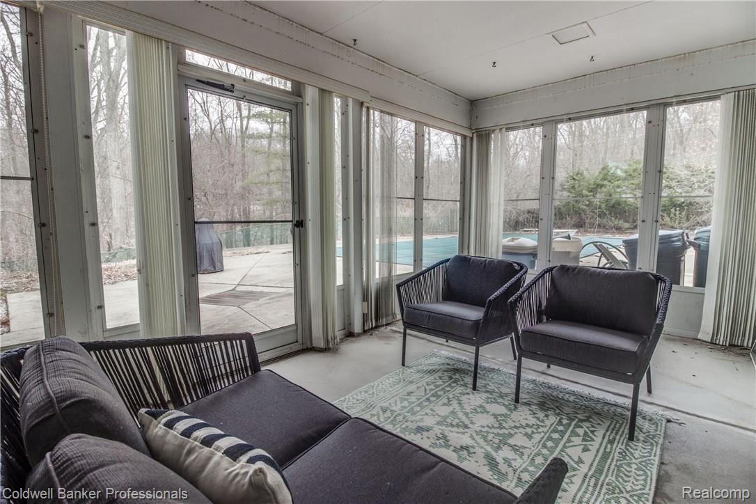5760 Cobb Creek Road Rochester, MI 48306 - Photo 22 of 27 Sun Room toward pool.jpeg